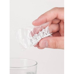 Perles fixantes - Pâte fixante pour dentier - Adhésif pour dents